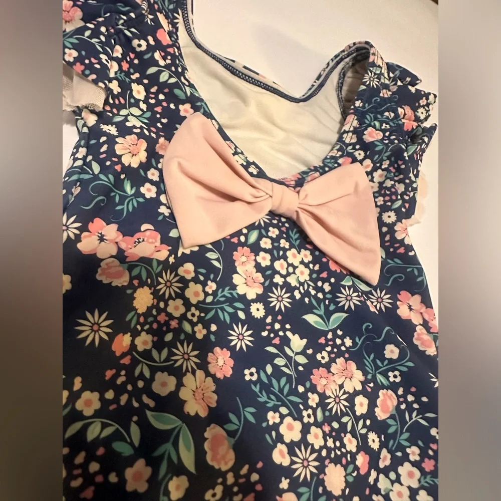 Ruffle Butts Flutter Sleeve Navy Floral Swimsuit